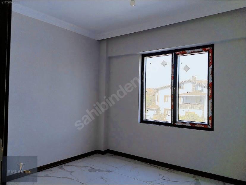 ÖMER EMLAKTAN  MERKEZİ KONUM SATILIK ARA KAT CAM BALKONLU 2+1