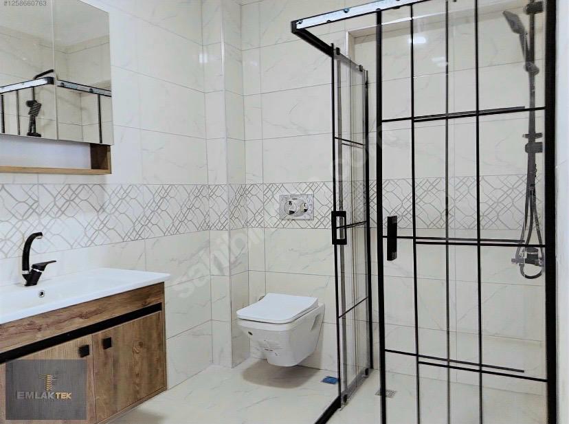 ÖMER EMLAKTAN  MERKEZİ KONUM SATILIK ARA KAT CAM BALKONLU 2+1