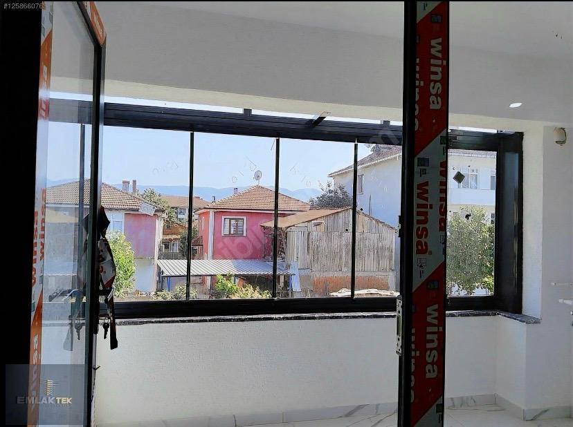 ÖMER EMLAKTAN  MERKEZİ KONUM SATILIK ARA KAT CAM BALKONLU 2+1