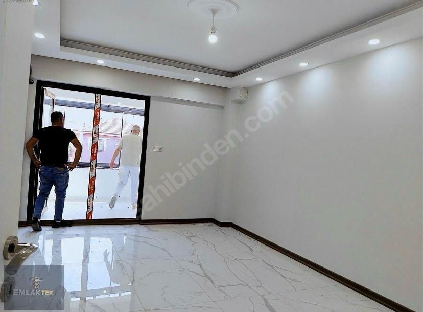 ÖMER EMLAKTAN  MERKEZİ KONUM SATILIK ARA KAT CAM BALKONLU 2+1