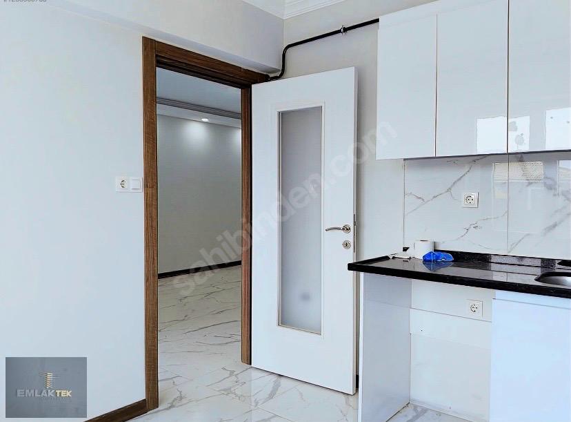 ÖMER EMLAKTAN  MERKEZİ KONUM SATILIK ARA KAT CAM BALKONLU 2+1
